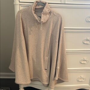 UGG women’s Sweater in tan.